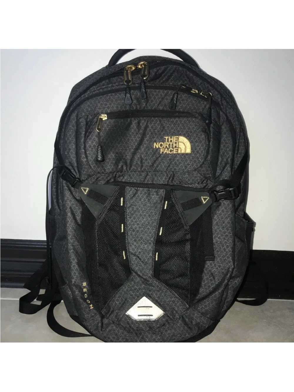 The North Face Black Backpack with Gold Accents Women’s